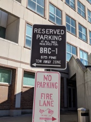 image of the sign labelling the reserved parking spaces